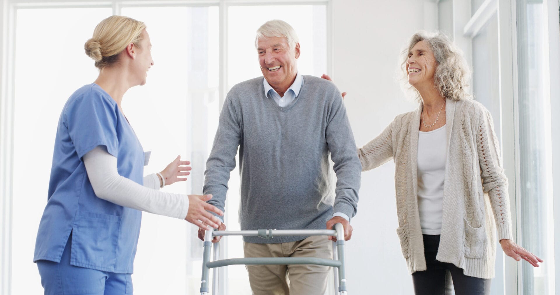 Caregiver, wife or elderly man with walker, support or love for